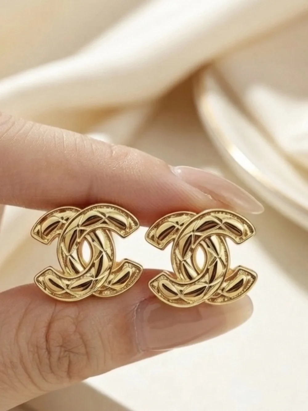 CHANEL Quilted Stud Earrings